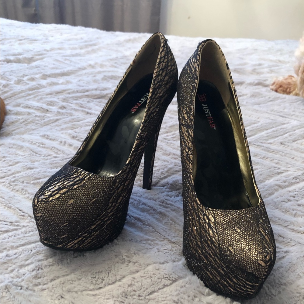 Gold and black stilettos